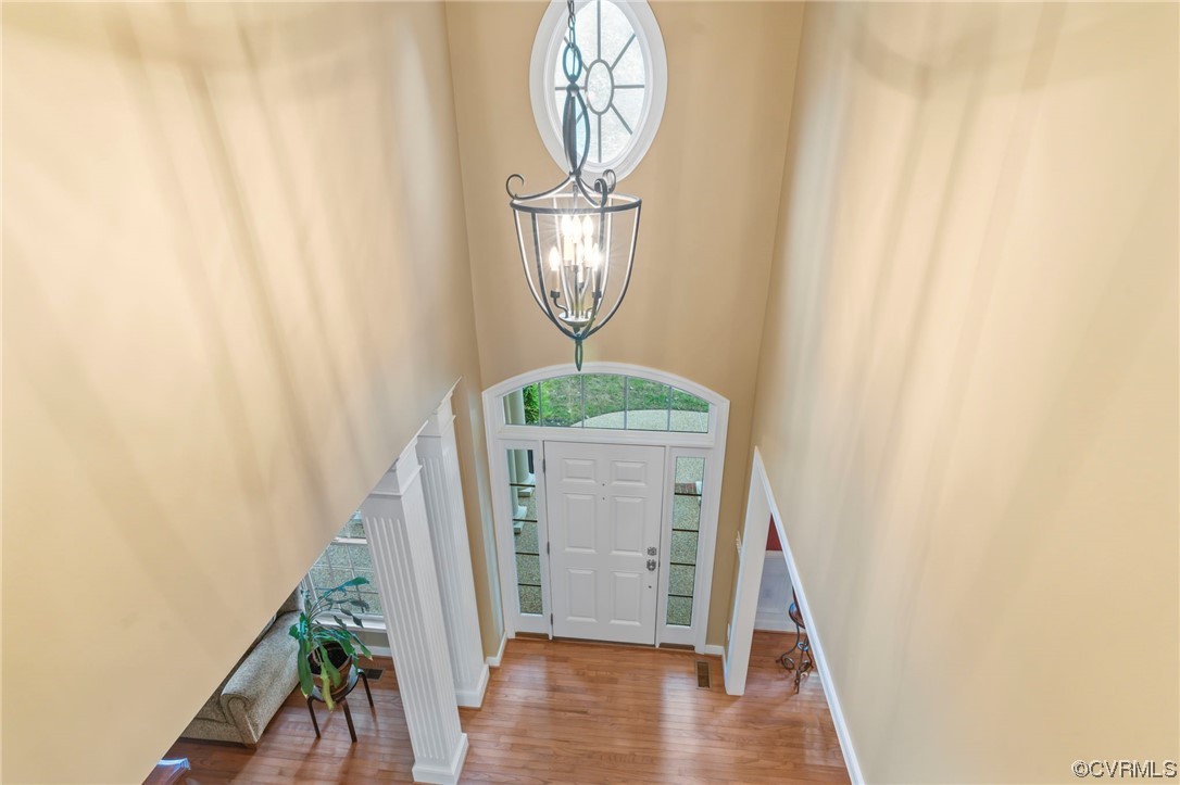13206 Tipple Point Road Midlothian, VA 23114 - Photo 17 of 50 a view of a hallway with wooden floor and entryway