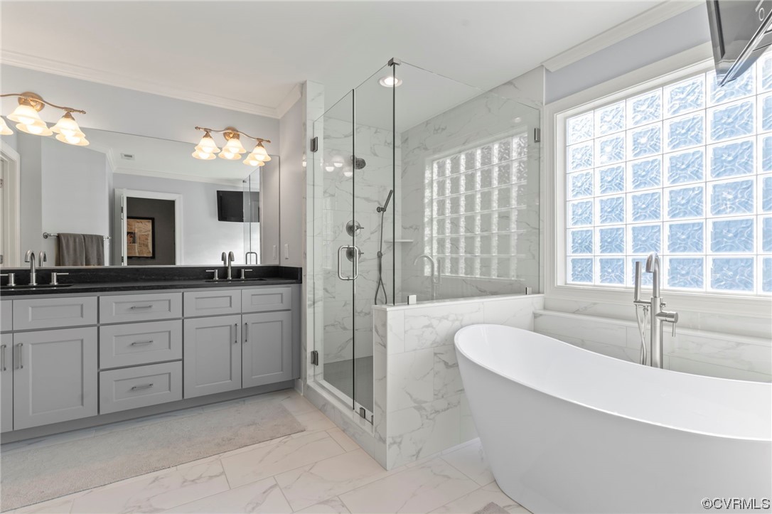 13206 Tipple Point Road Midlothian, VA 23114 - Photo 22 of 50 a spacious bathroom with a granite countertop tub shower and mirror