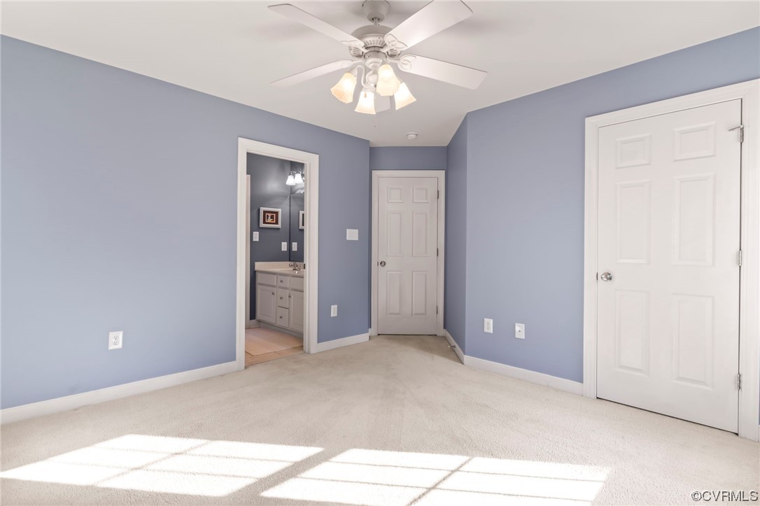 13206 Tipple Point Road Midlothian, VA 23114 - Photo 26 of 50 a view of a room with a chandelier fan and closet area