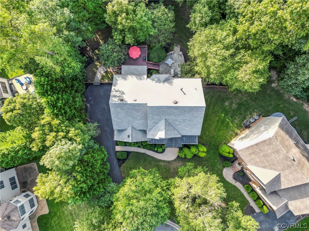 13206 Tipple Point Road Midlothian, VA 23114 - Photo 45 of 50 an aerial view of a house with table and chairs and a fire pit