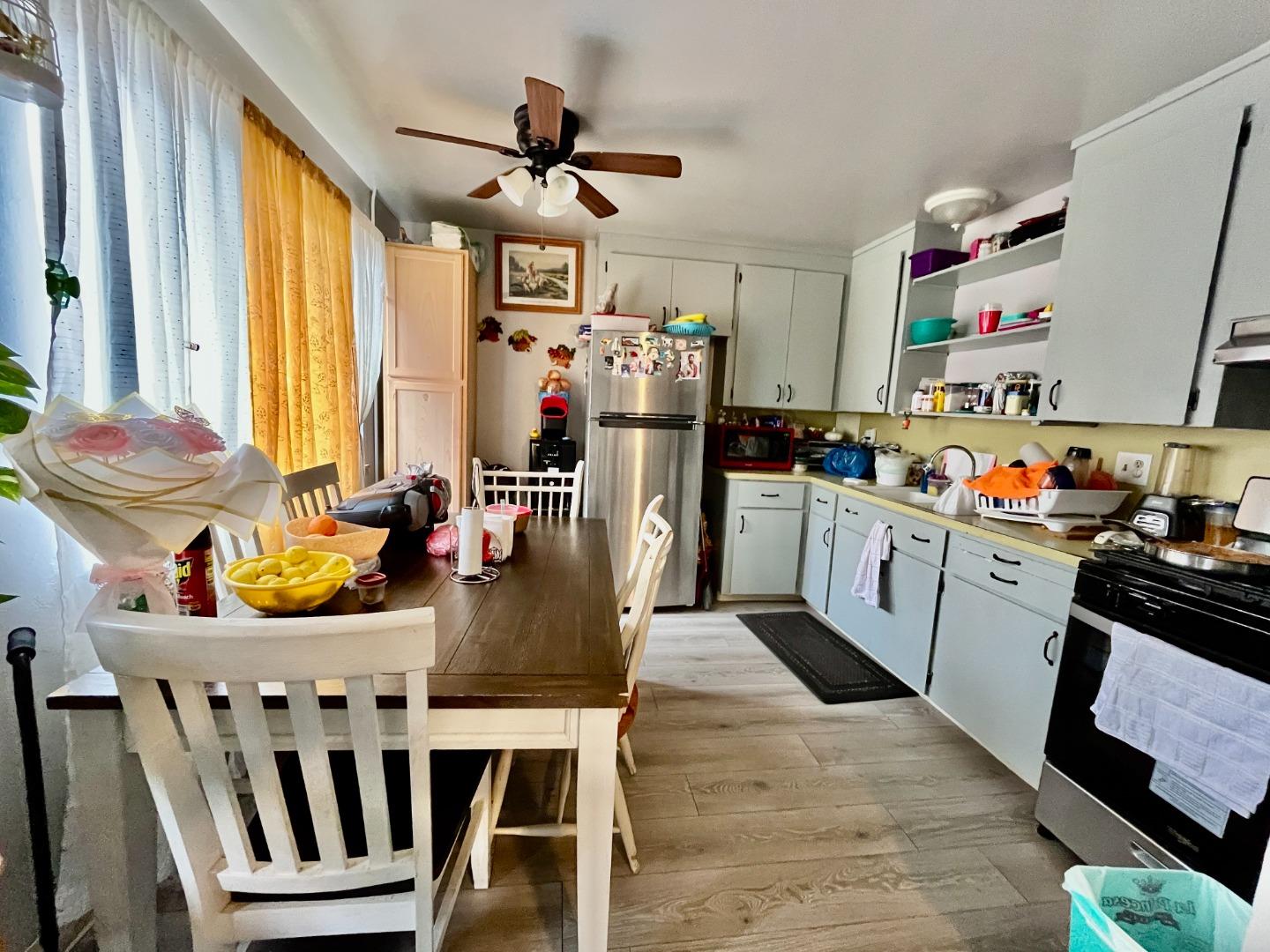 128 Maple Avenue Watsonville, CA 95076 - Photo 13 of 29 a view of kitchen and dining area with furniture window