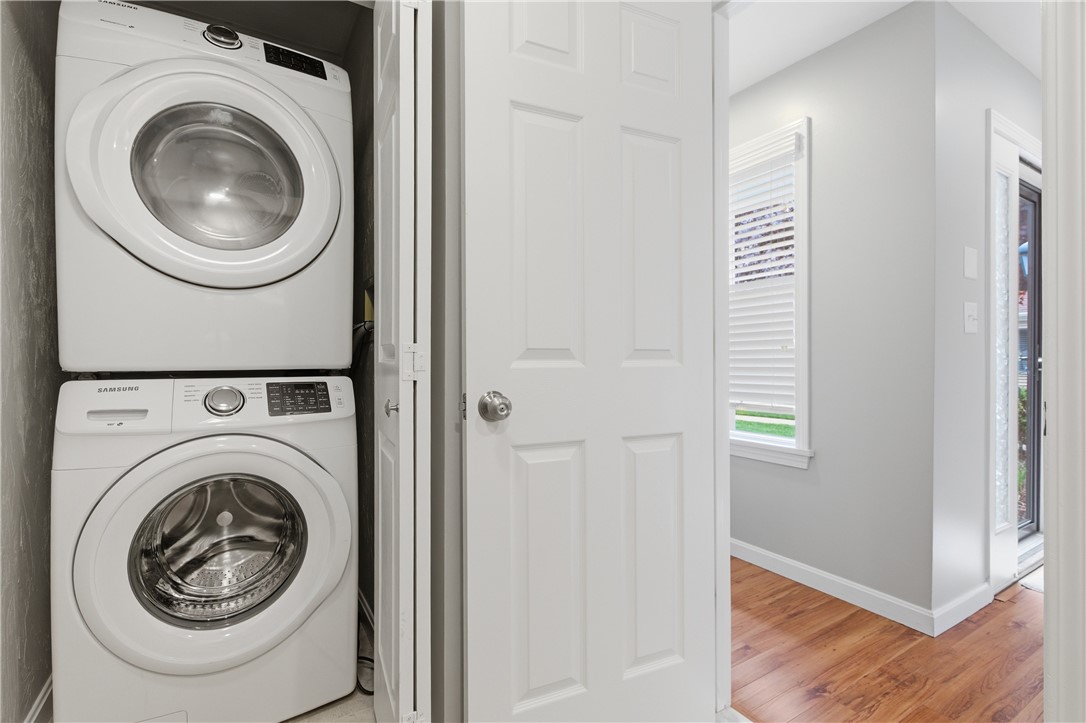 50 Abbott Run Valley Road, Unit 1604 Cumberland, RI 02864 - Photo 13 of 30 Laundry is in the half bath next to garage entrance .