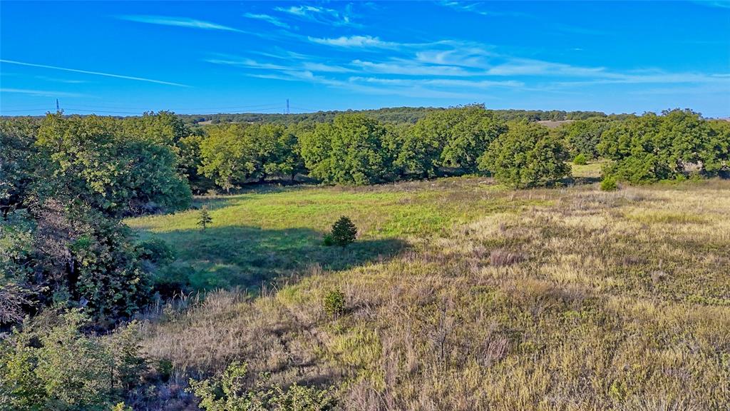4 4 Wire Road Bowie, TX 76230 - Photo 19 of 39 a view of a lake with a city
