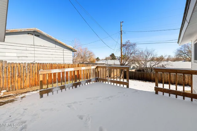 a view of a balcony with chairs
