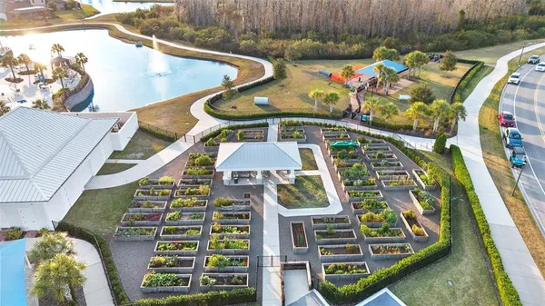 an aerial view of a house with outdoor space