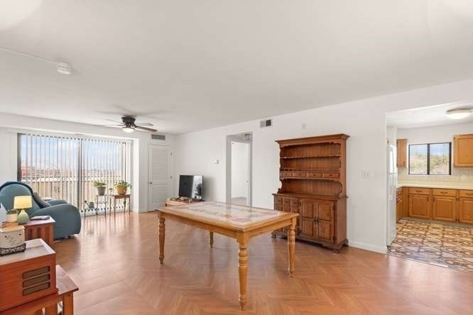 198 Locust Street, Unit 1702 Lynn, MA 01904 - Photo 5 of 26 a living room with furniture and wooden floor