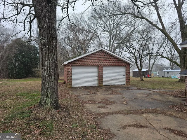 a house with trees in front of it