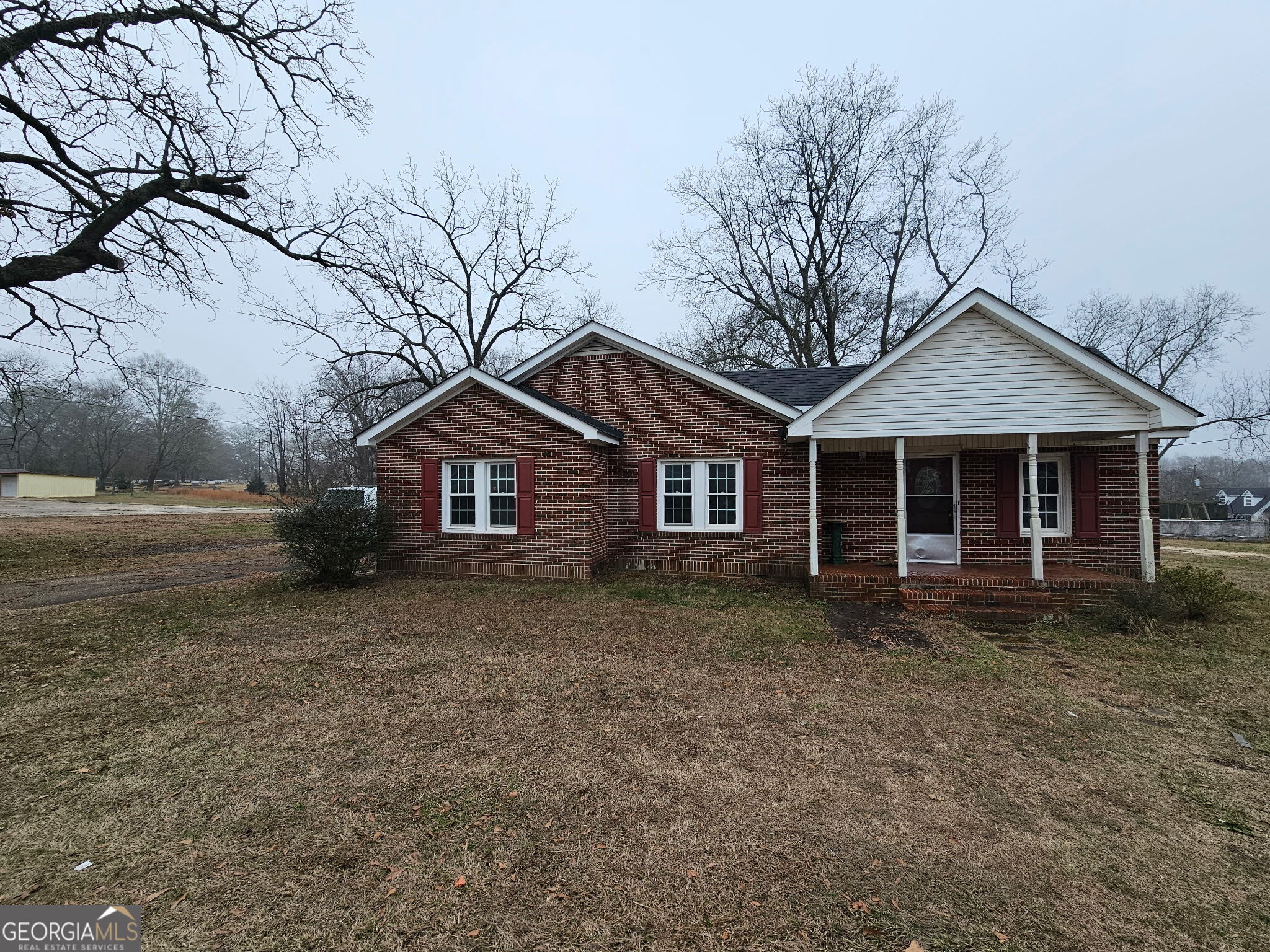 410 Atlantic Avenue Bremen, GA 30110 - Photo 10 of 10 a front view of a house with yard
