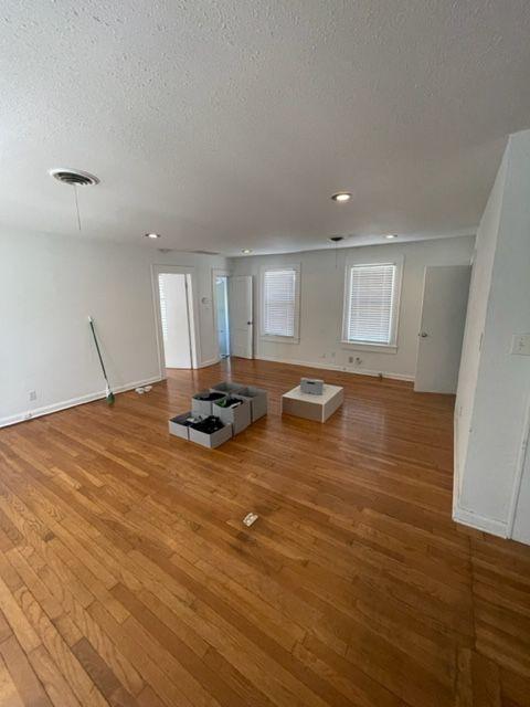 207 West 39th Street, Unit B Austin, TX 78751 - Photo 7 of 20 a view of a room with wooden floor