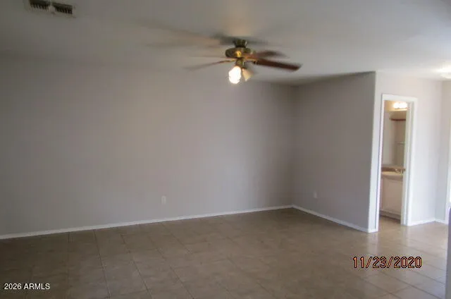 a kitchen with a stove and a refrigerator