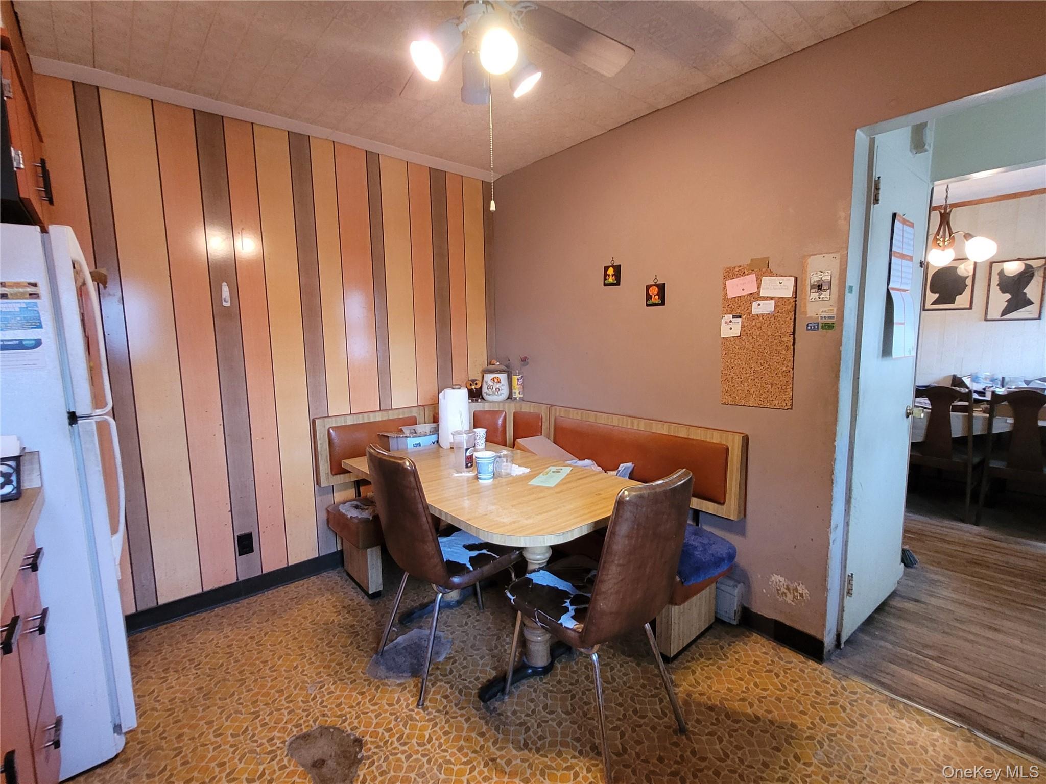 12 Clark Street Plainview, NY 11803 - Photo 8 of 14 a workspace with furniture and window