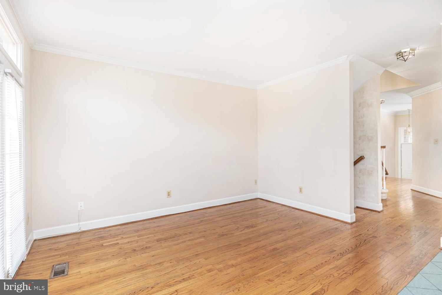 8165 Madrillon Court Vienna, VA 22182 - Photo 13 of 33 a view of a room with wooden floor
