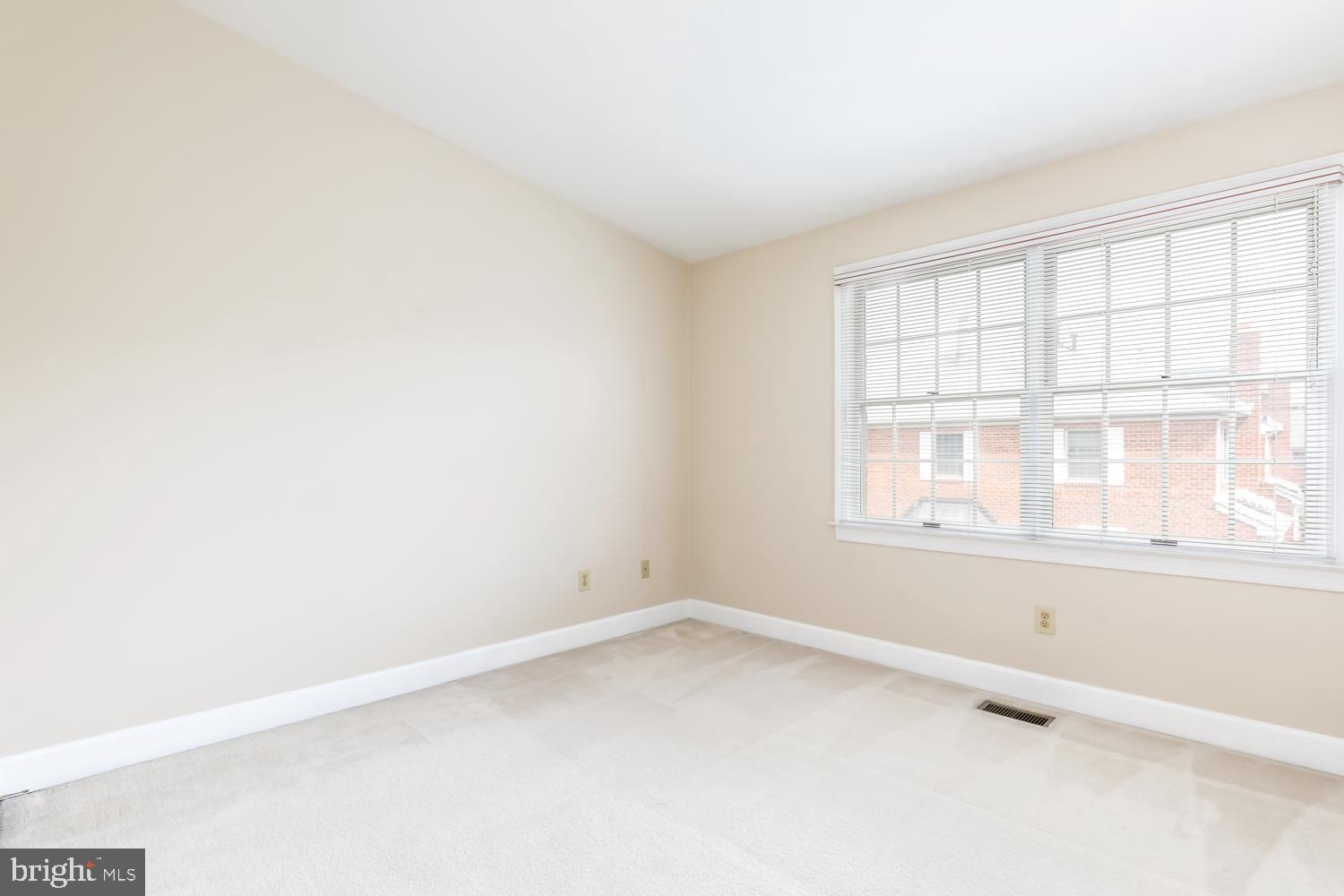 8165 Madrillon Court Vienna, VA 22182 - Photo 21 of 33 an empty room with a window