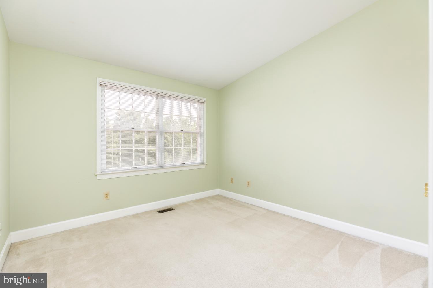 8165 Madrillon Court Vienna, VA 22182 - Photo 22 of 33 an empty room with a window