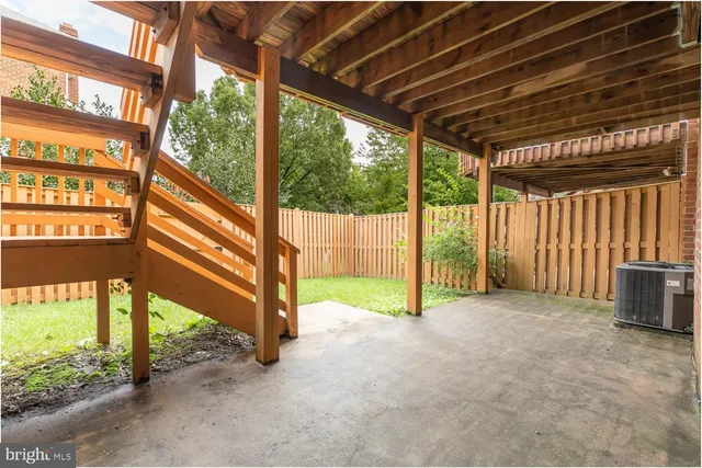 a view of a wooden fence