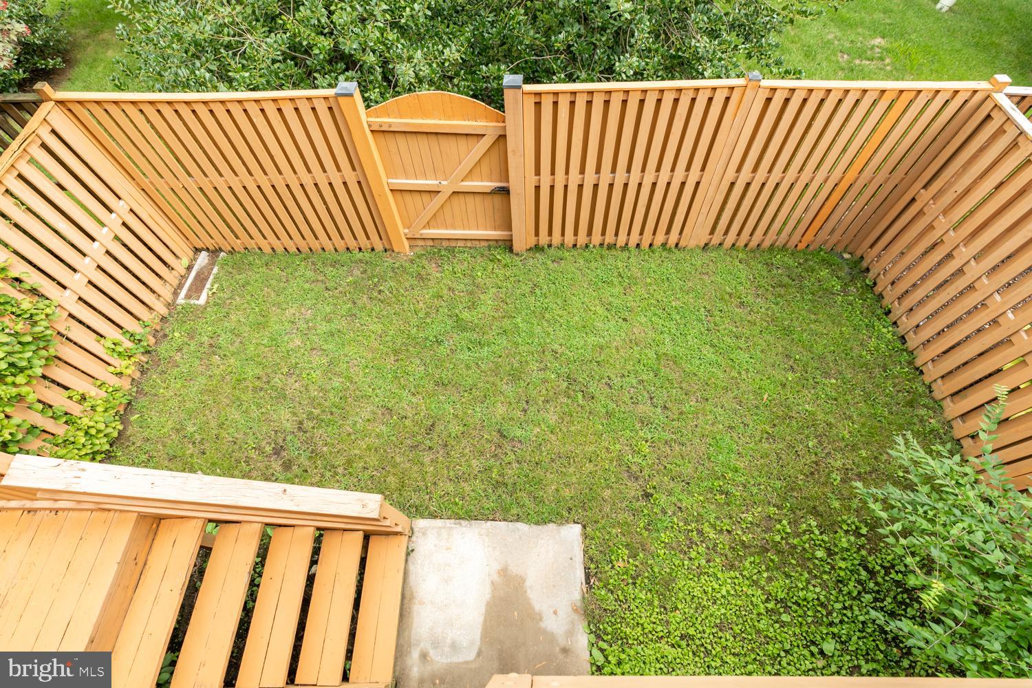 8165 Madrillon Court Vienna, VA 22182 - Photo 27 of 33 a view of a wooden fence