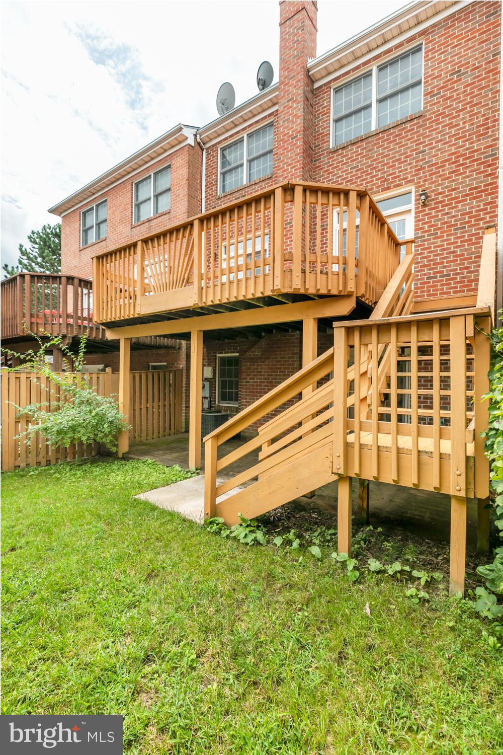 8165 Madrillon Court Vienna, VA 22182 - Photo 28 of 33 a view of a house with a yard