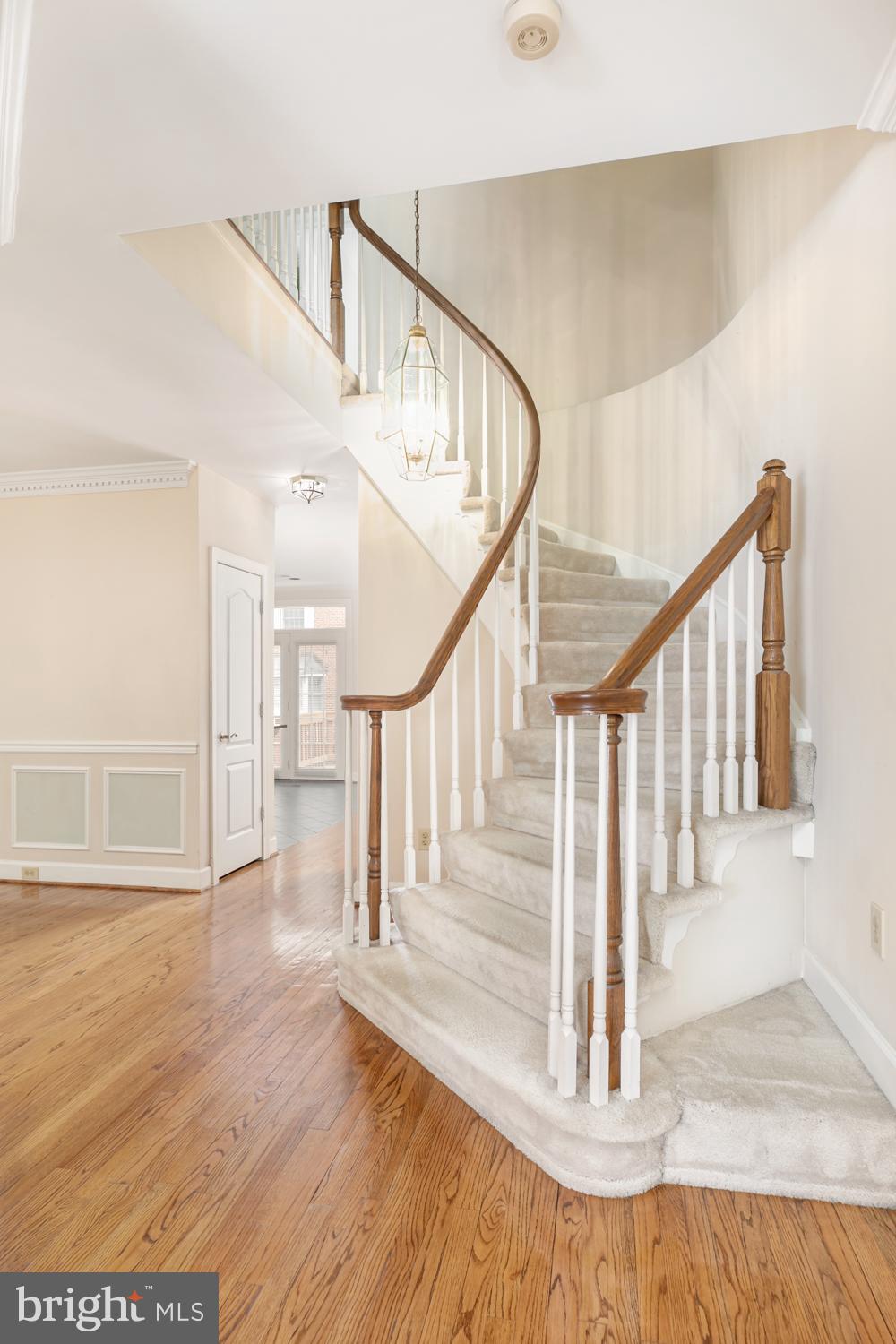8165 Madrillon Court Vienna, VA 22182 - Photo 6 of 33 a view of entryway and hall with wooden floor