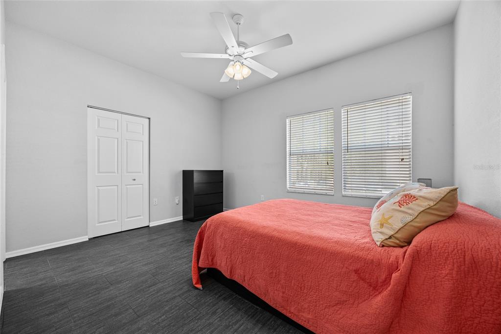 5141 Southwest 91st Way, Unit I102 Gainesville, FL 32608 - Photo 11 of 25 a bedroom with a bed and a window