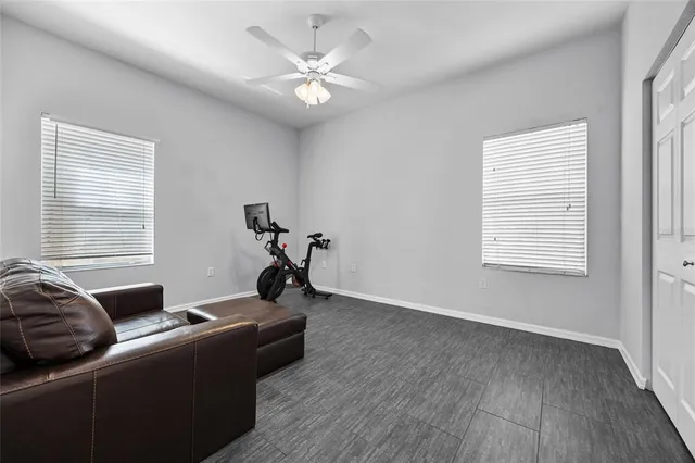 a living room with furniture and a window