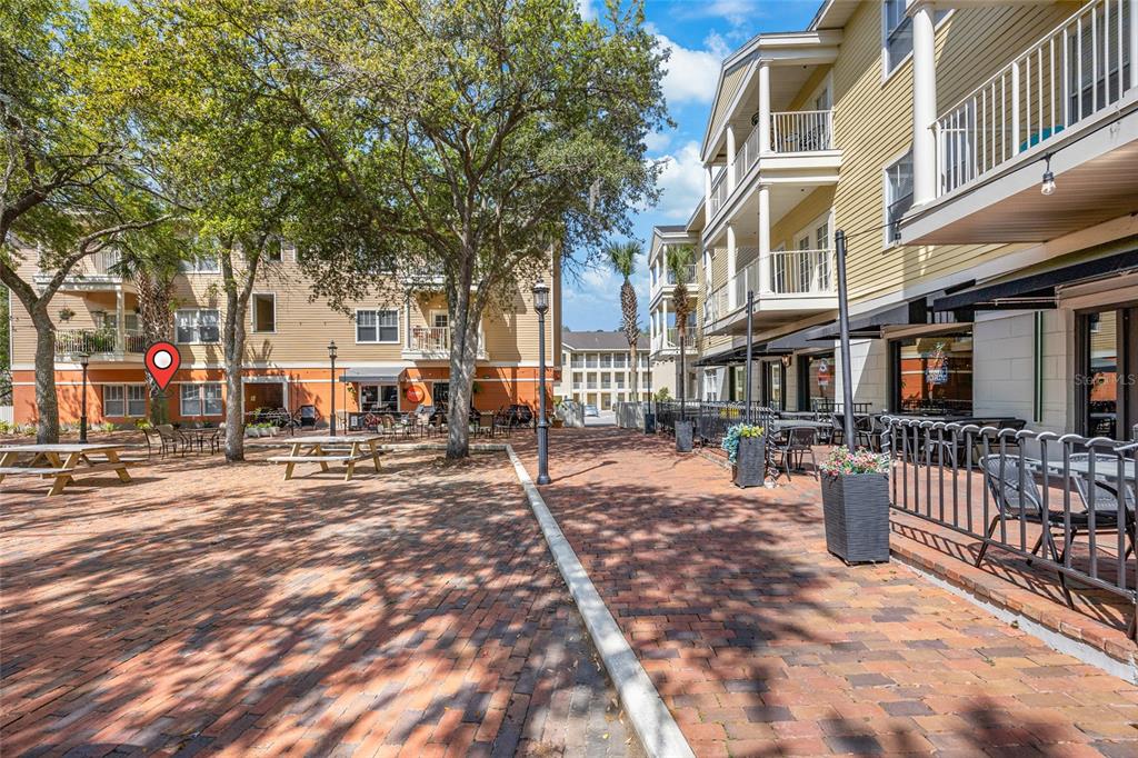 5141 Southwest 91st Way, Unit I102 Gainesville, FL 32608 - Photo 20 of 25 a view of a city with pathway