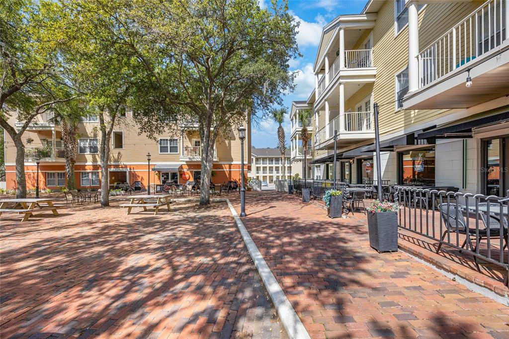 5141 Southwest 91st Way, Unit I102 Gainesville, FL 32608 - Photo 2 of 25 a view of a city with pathway