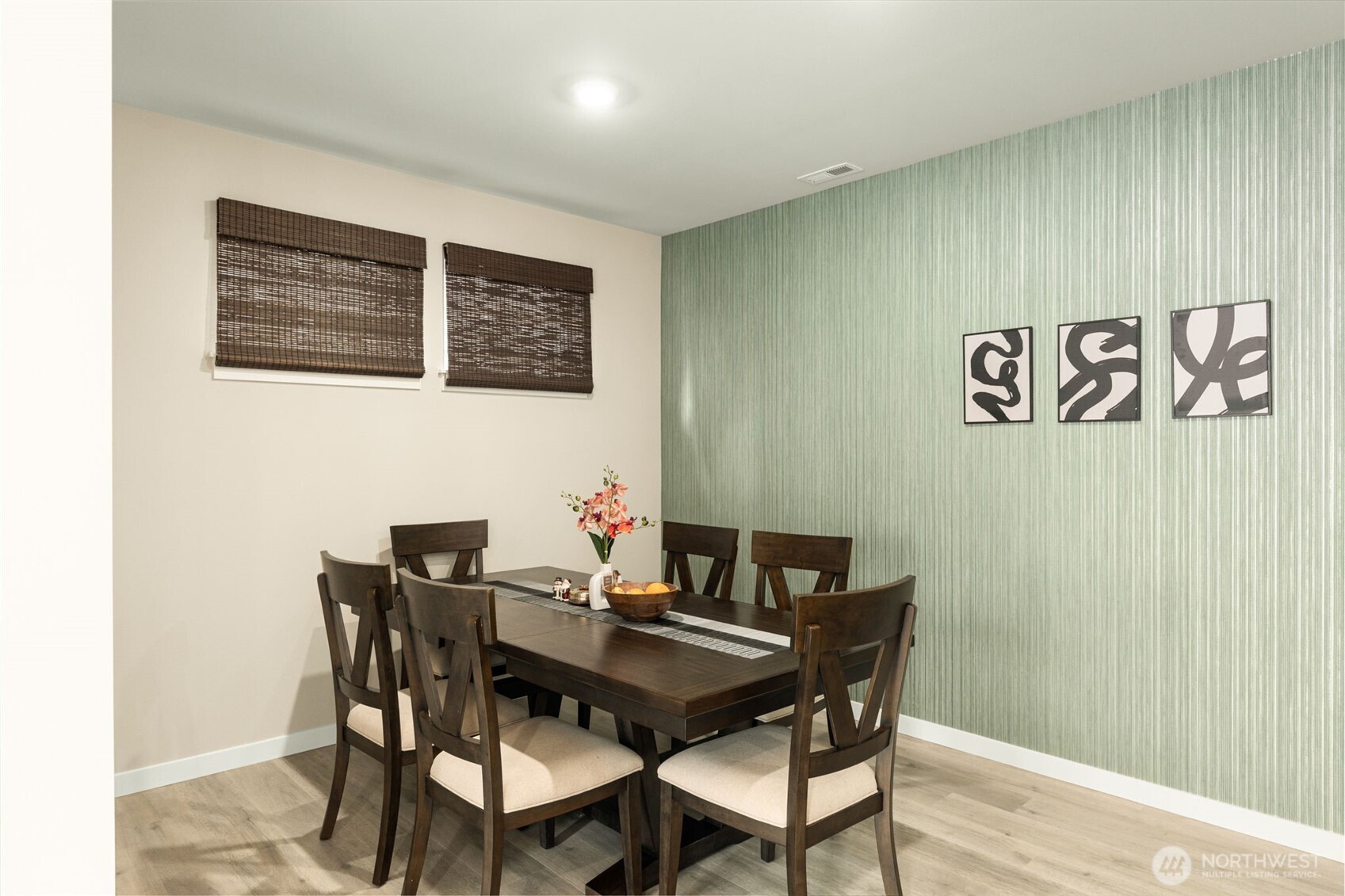 19410 28th Drive Southeast Bothell, WA 98012 - Photo 21 of 37 a view of a dining room with furniture and wooden floor