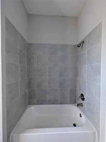 a bathroom with a bathtub