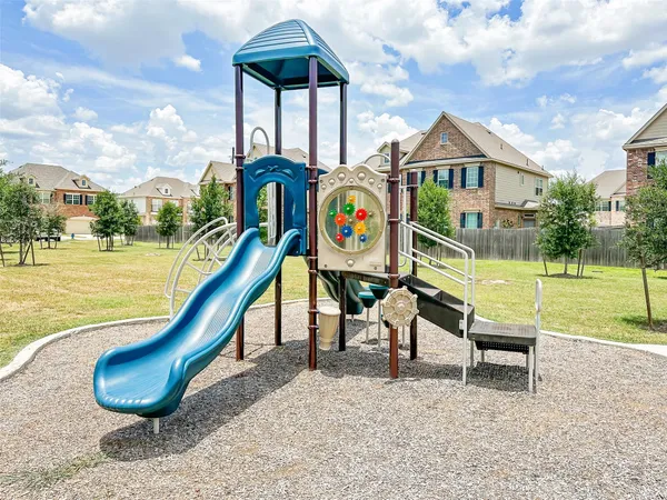 a view of a park with slide