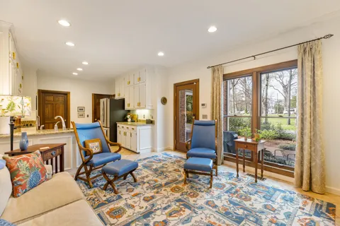 a living room with furniture and a table
