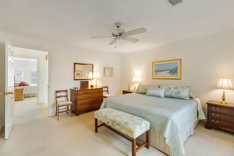 a bedroom with a bed and furniture