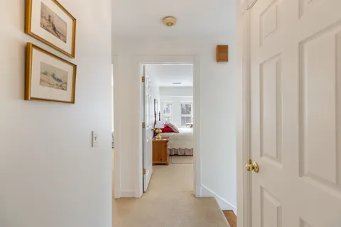 a view of a hallway with kids room