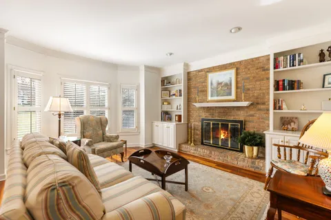 a living room with furniture or fireplace and a large window
