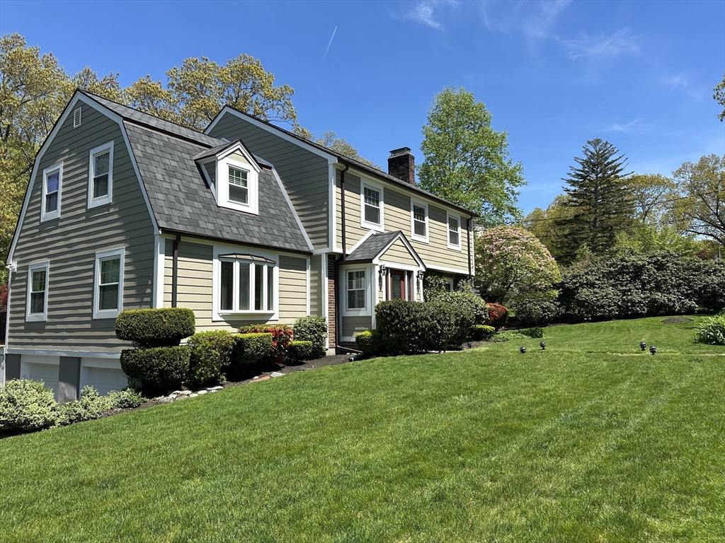 45 Wellesley Road Belmont, MA 02478 - Photo 39 of 42 a front view of a house with a garden