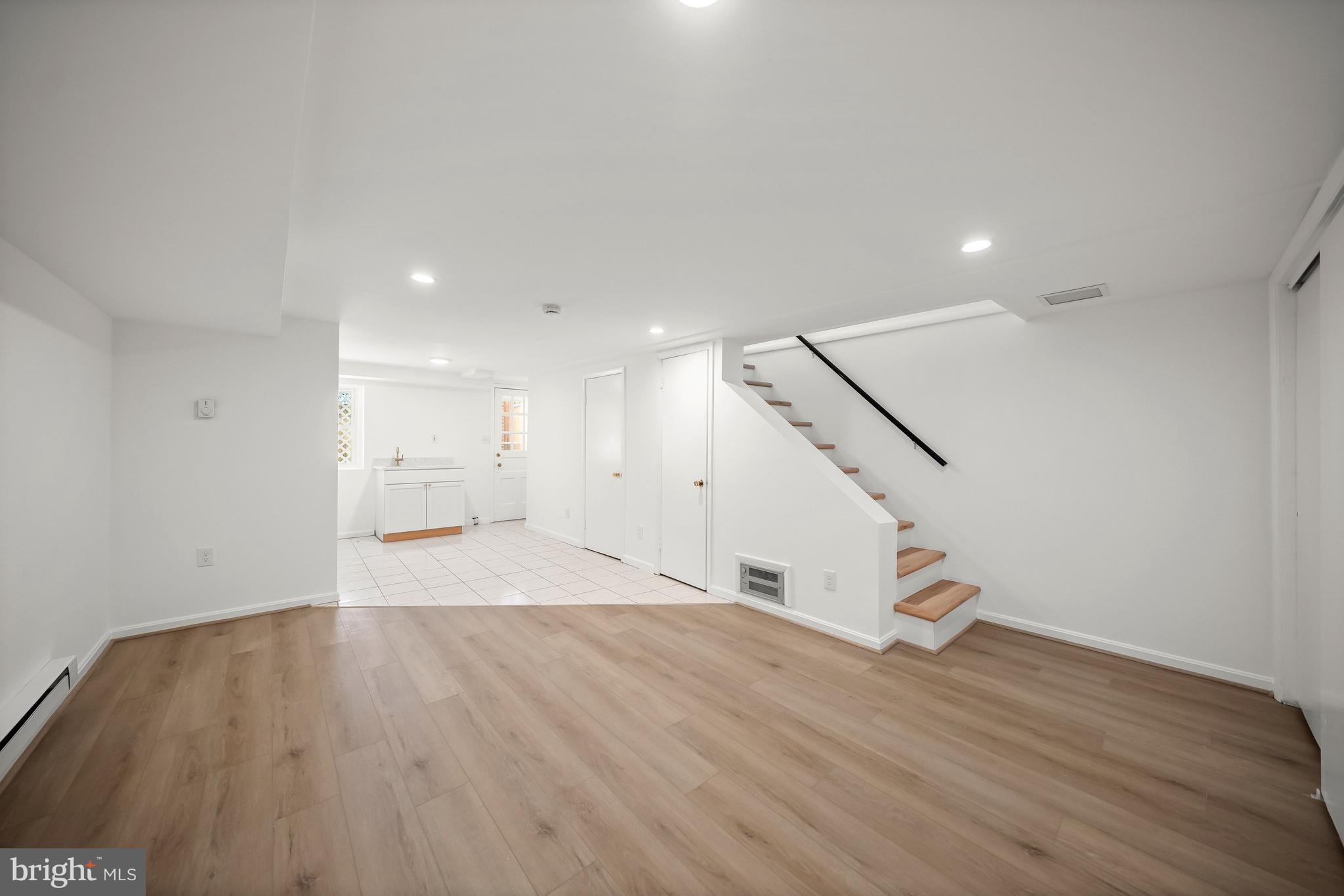 1945 39th Street Northwest Washington, DC 20007 - Photo 15 of 29 Lower level rec room/potential 3rd bedroom/guest s