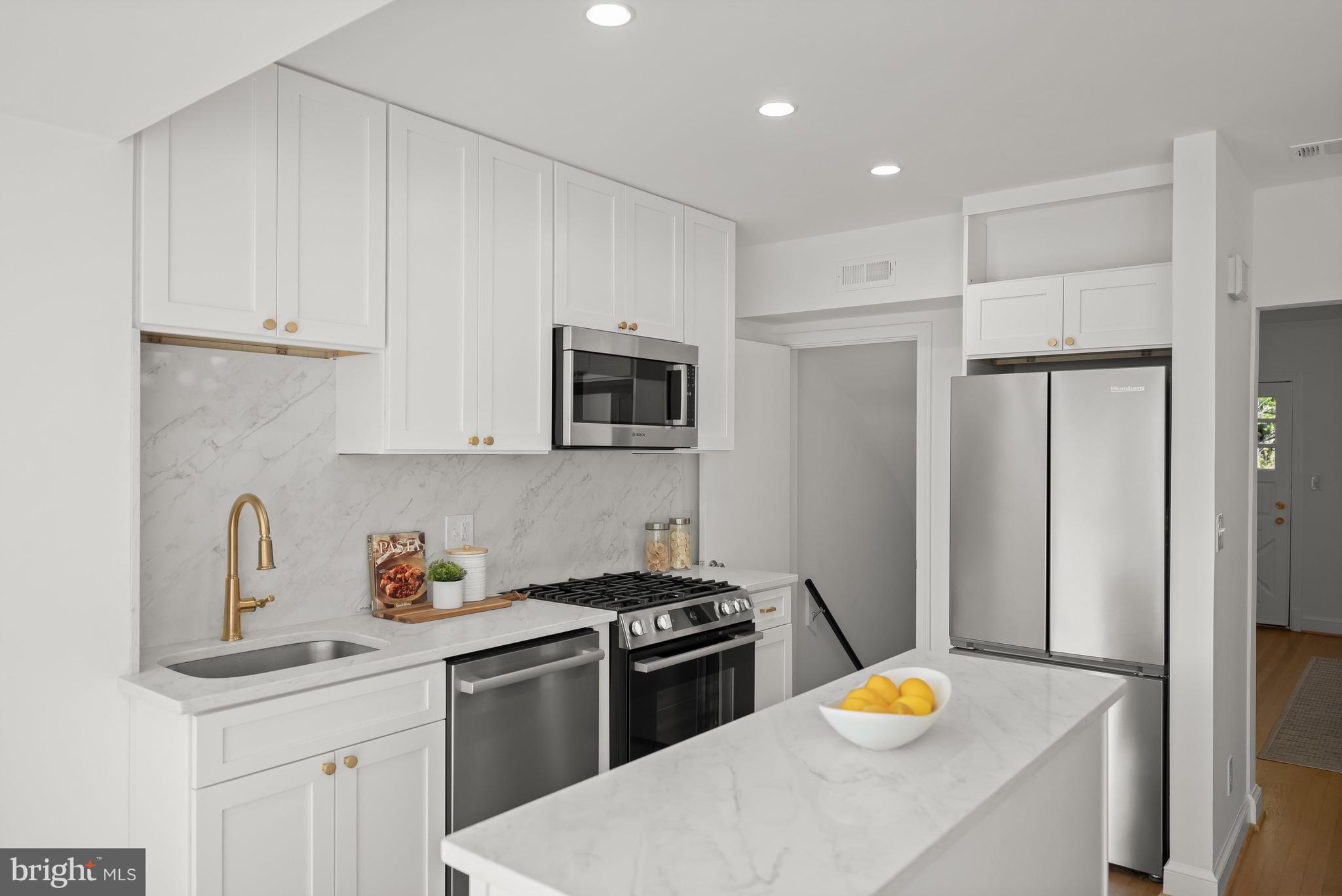 1945 39th Street Northwest Washington, DC 20007 - Photo 5 of 29 New cabinetry, quartz counters and new Bosch appli