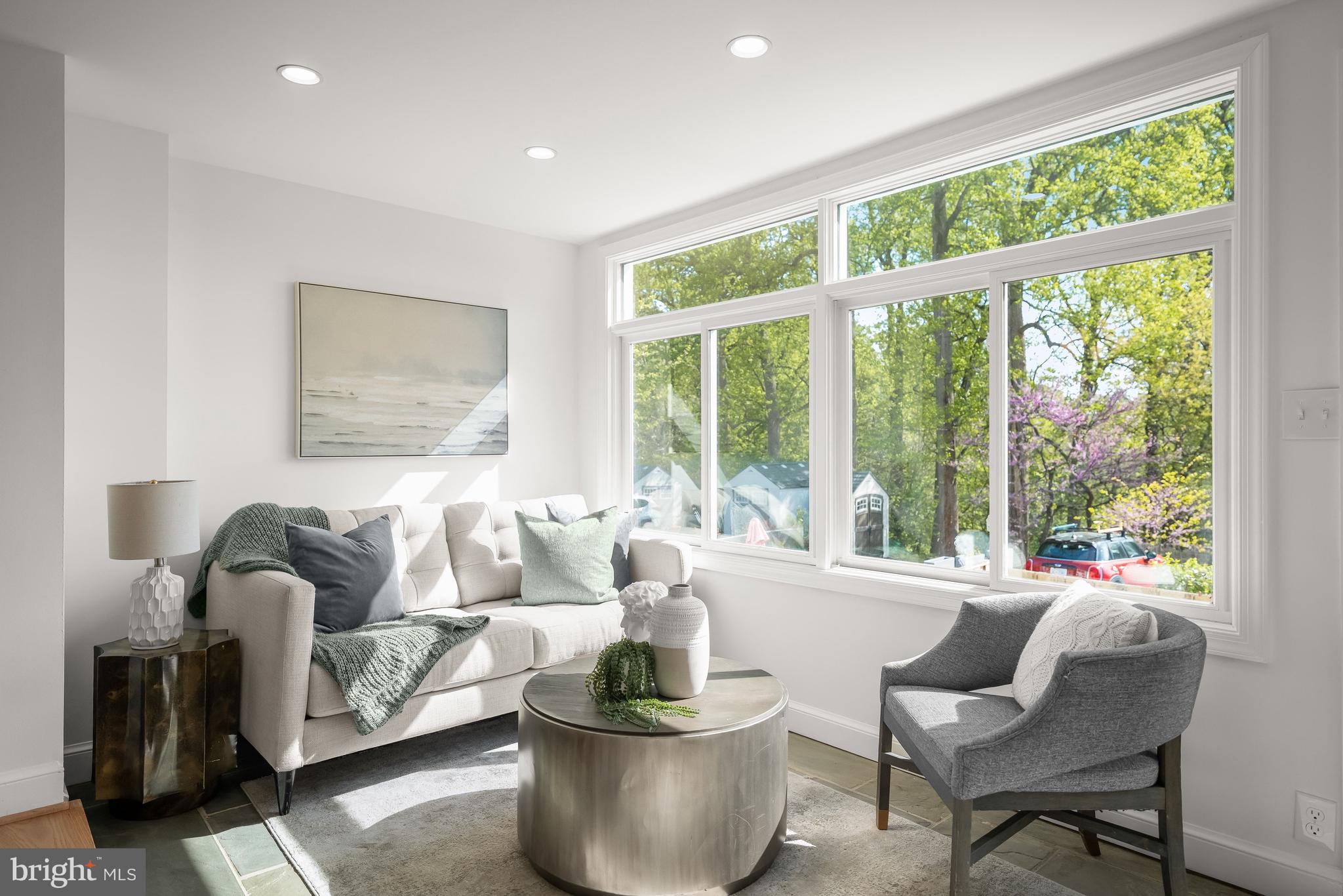 1945 39th Street Northwest Washington, DC 20007 - Photo 7 of 29 Expansive windows fill the family room with light