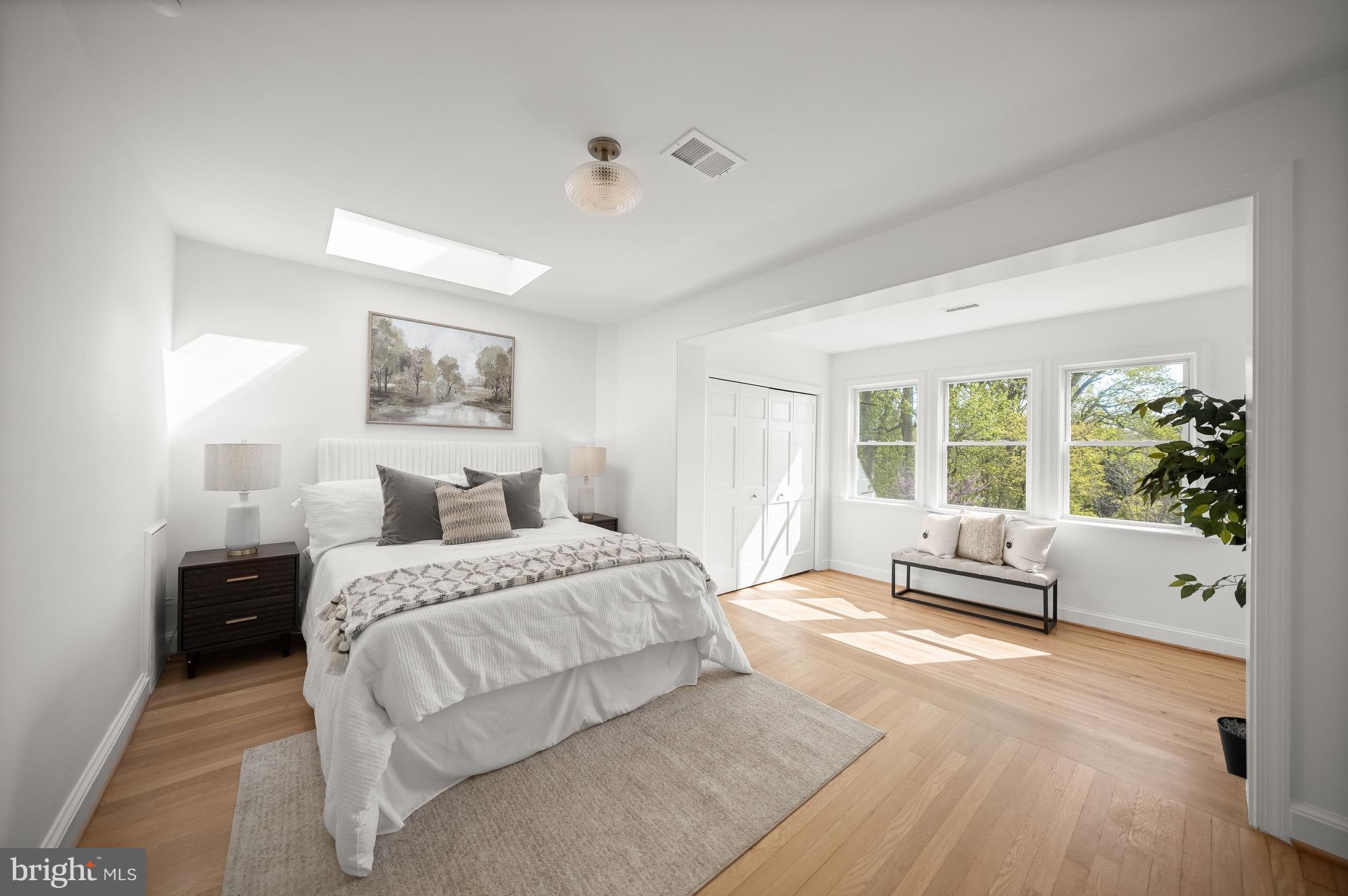 1945 39th Street Northwest Washington, DC 20007 - Photo 9 of 29 Sunlit primary bedroom w/ sitting area