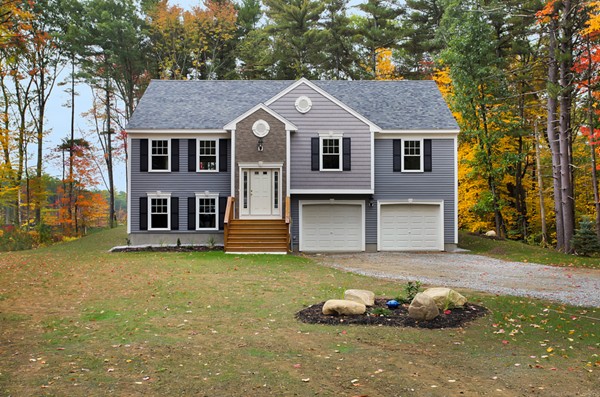 78 Groton Road Shirley, MA 01464 - Photo 1 of 30 a front view of a house with a yard