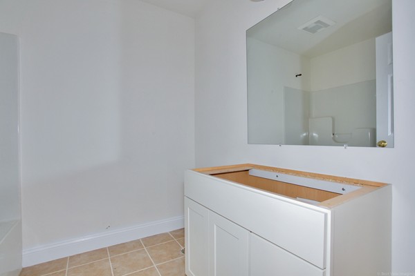 78 Groton Road Shirley, MA 01464 - Photo 12 of 30 a utility room with dryer and washer