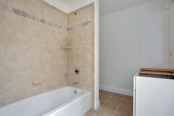 78 Groton Road Shirley, MA 01464 - Photo 13 of 30 a bathroom with a bathtub and a shower