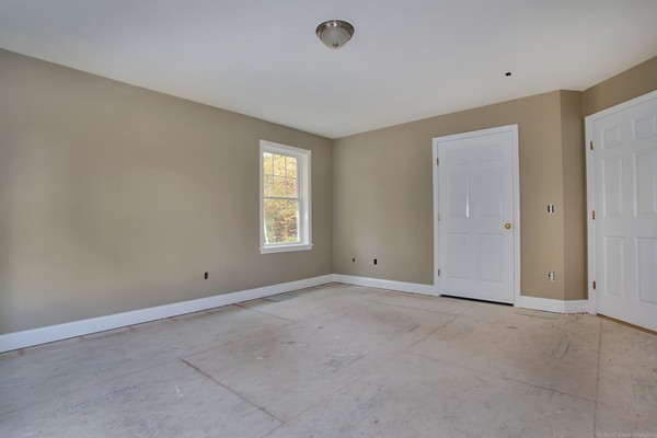 78 Groton Road Shirley, MA 01464 - Photo 14 of 30 a view of an empty room with a window
