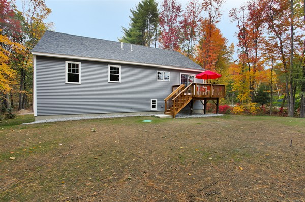 78 Groton Road Shirley, MA 01464 - Photo 27 of 30 a view of a house with backyard and tree