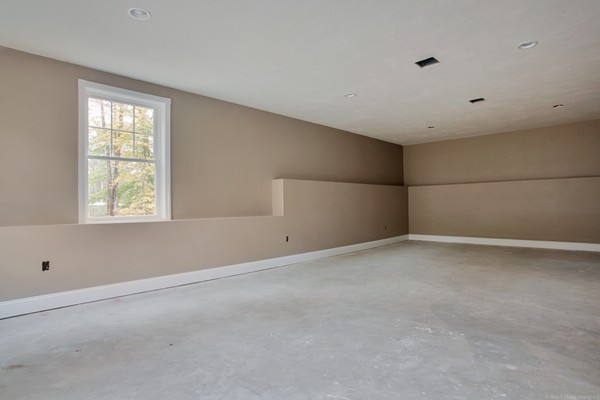 78 Groton Road Shirley, MA 01464 - Photo 5 of 30 a view of an empty room with a window