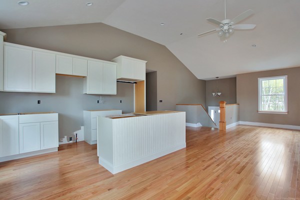 78 Groton Road Shirley, MA 01464 - Photo 9 of 30 a living room with furniture and a wooden floor