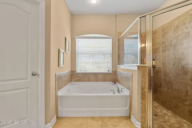 a view of a swimming pool with an outdoor space and seating area