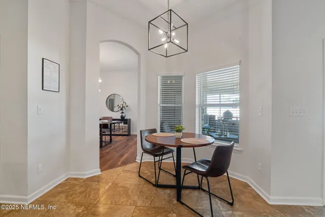 a view of a balcony with an outdoor space and seating area