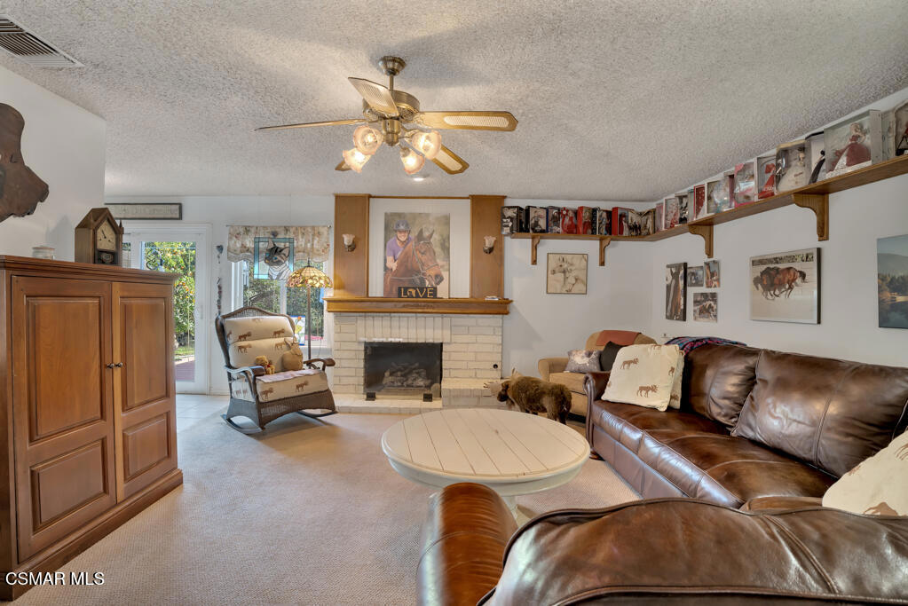 1278 Rambling Road Simi Valley, CA 93065 - Photo 14 of 76 a bedroom with furniture and a fireplace