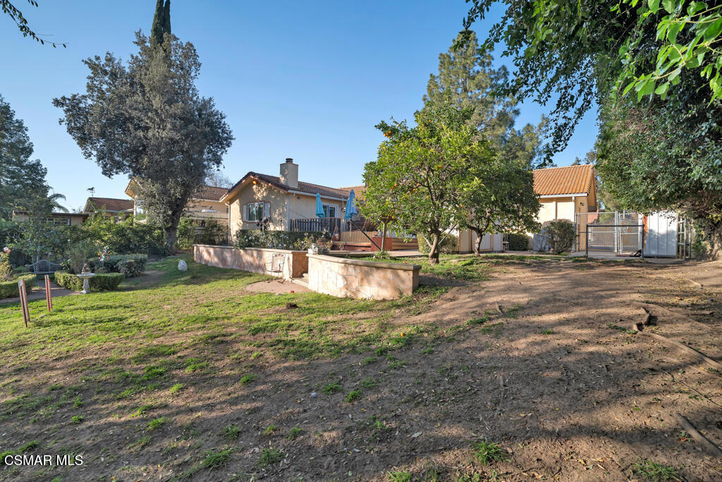 1278 Rambling Road Simi Valley, CA 93065 - Photo 31 of 76 a view of a house with a yard