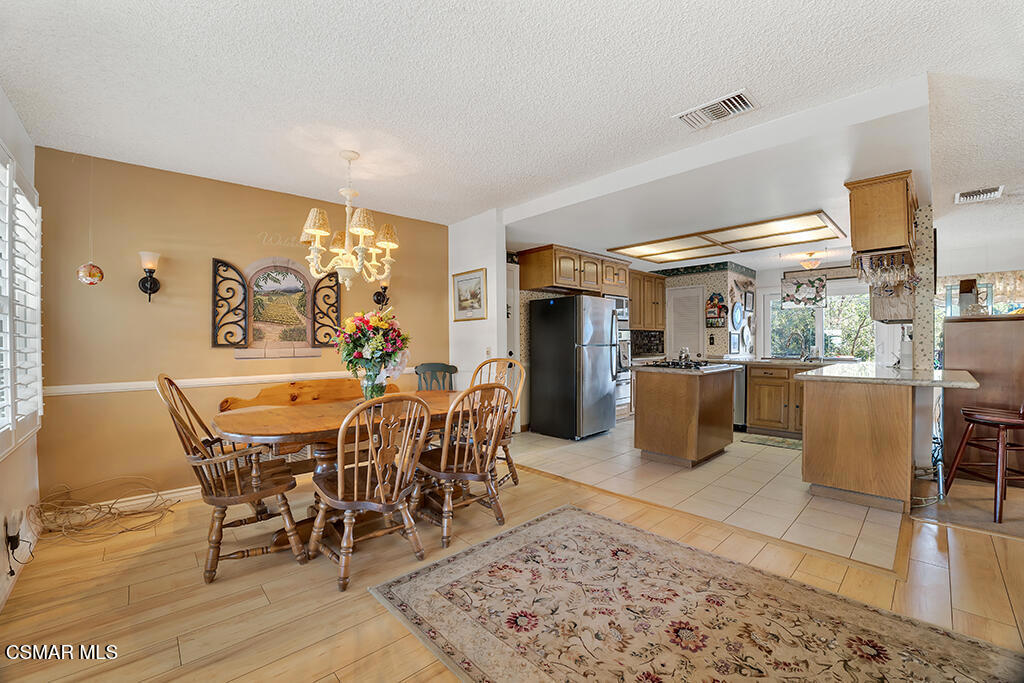 1278 Rambling Road Simi Valley, CA 93065 - Photo 4 of 76 a view of a dining room with furniture
